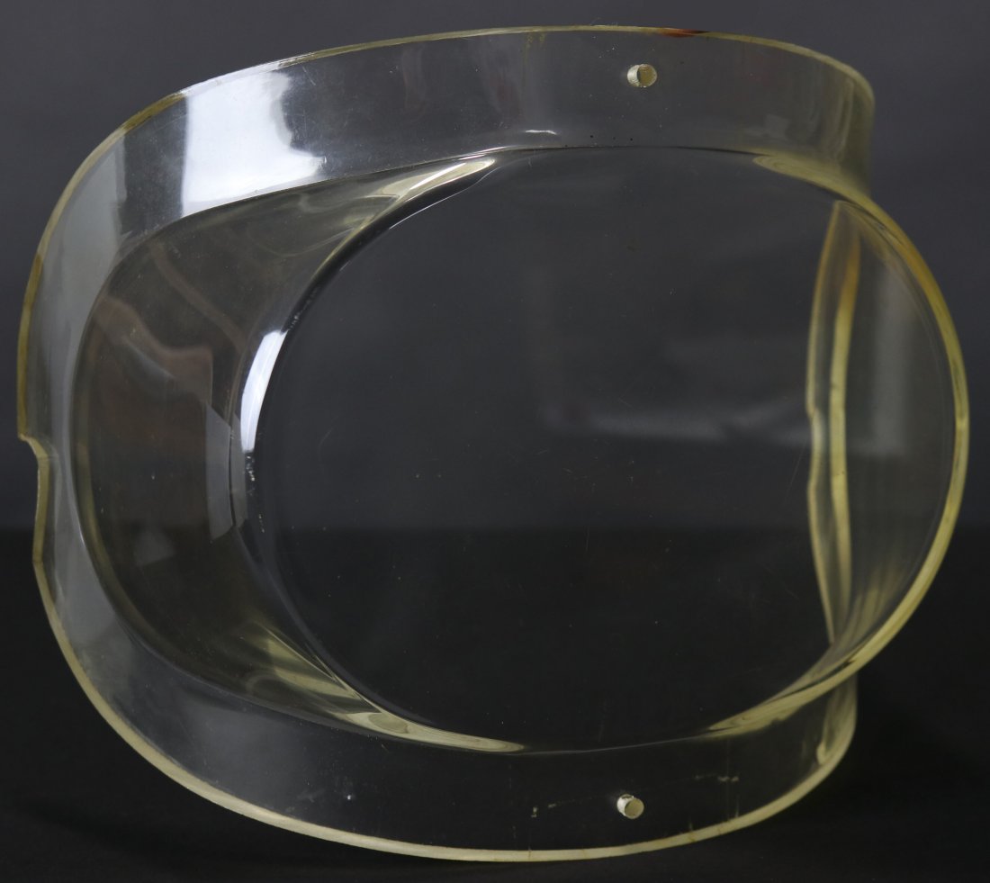 Joe Savoie Diving Helmet Face Port: Extremely rare opportunity to purchase an original Joe Savoie helmet face port. The piece is in excellent condition. It does have some very light scratches and it is possible the face port was install