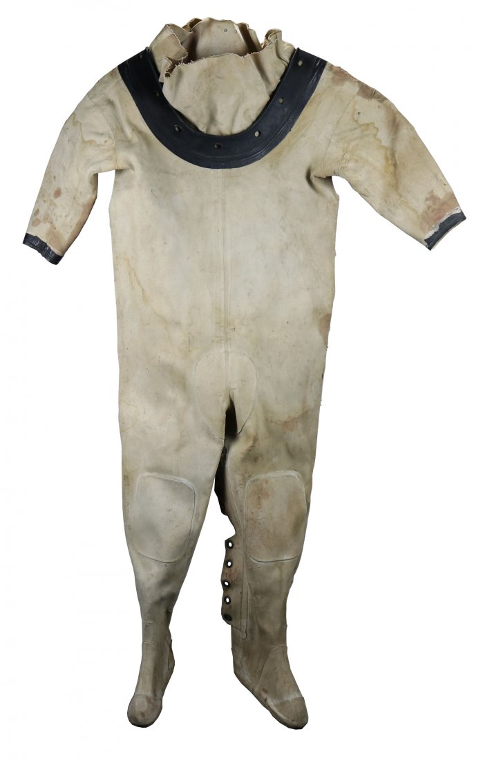 Converse Rubber Co Mark V Canvas Divers Dress or Suit: Nice example of used canvas divers dress or suit. This dress is punched for a standard 12 bolt US Navy Mark V diving helmet. Rubber collar has the Converse Rubber Company impression on it. The suit is