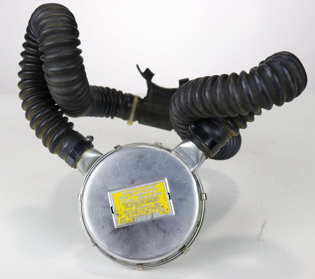 US Divers Aqua-Lung DW Mistral 1 Stage Regulator: Double hose regulator made by U.S. Divers Co. This model is a DW Mistral 1 stage regulator. This example features the ID plate with West Pico Boulevard address. Condition of the rubber hose and mouthp