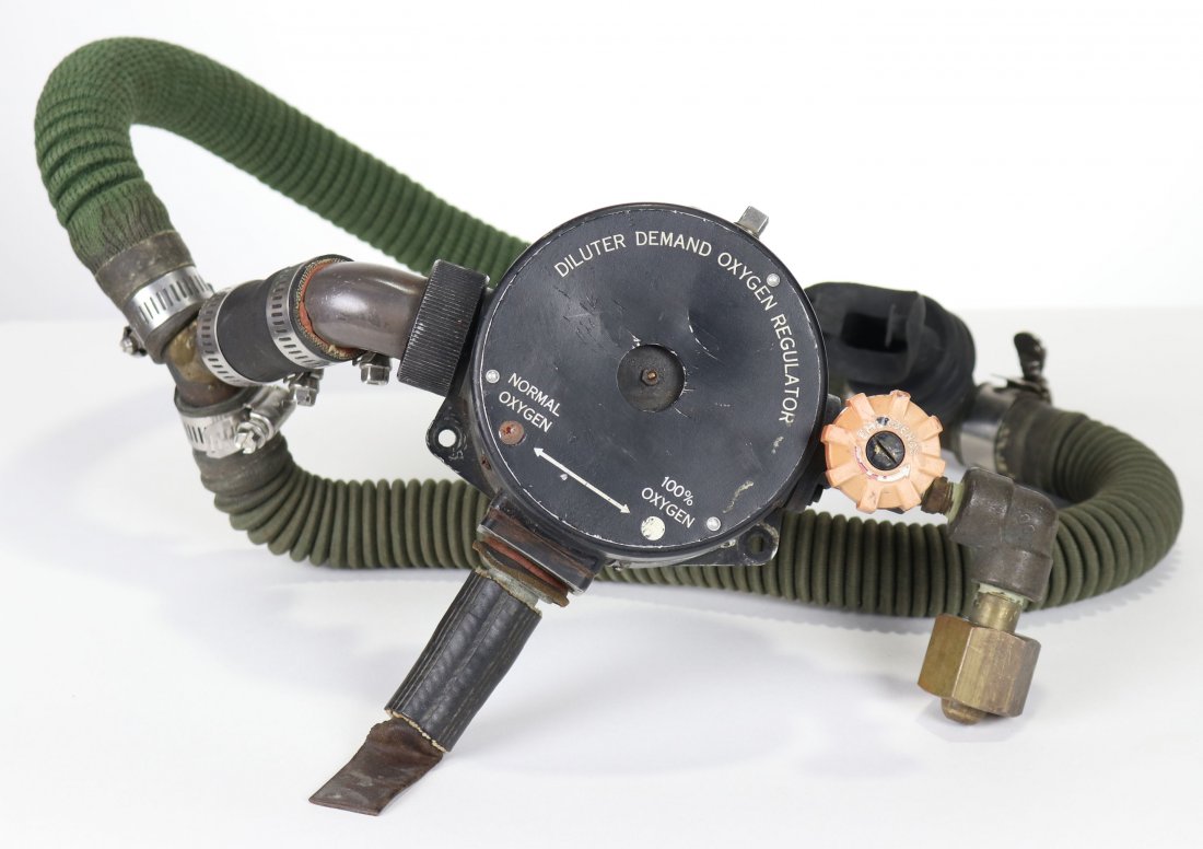 WWII Diluter SCUBA regulator.: A circa late 1940’s – early 1950’s home made two hose scuba demand regulator made from New Old Stock (NOS) aircraft O2 demand regulator and gas mask hoses, as shown in Popular Science magazine 1