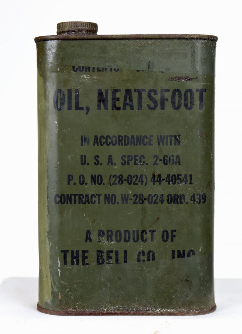 Original WWII US Forces Can of Neatsfoot Oil: A WWII USN Diving Locker essential for maintenance of all leather parts such as weight belt, boots, neck ring gasket etc. The can is clearly marked and in fair to good condition as seen, and there is 