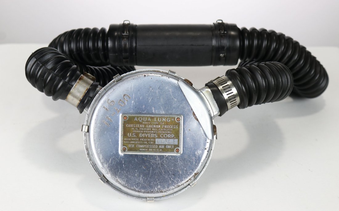 UTD 11 Issue Aqua-Lung Double Hose Regulator & Manual: Rare opportunity to own a US Divers Aqua-Lung double hose regulator issued to Underwater Demolition Team 11. Likely issued in the mid-1950s the regulator is engraved on the front UDT-11 91. Regulator