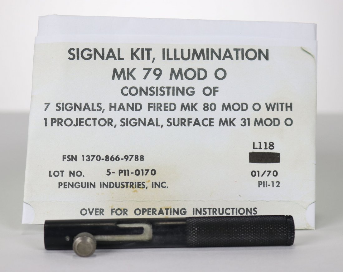 US Navy Handheld Signal Detonator – MK 79 Pencil Type: Interesting piece of US Navy equipment used for signaling. This is a Mark 79 hand held signal detonator or projector. Measuring only 4.5 inches long, this model has a lever that is spring loaded. When