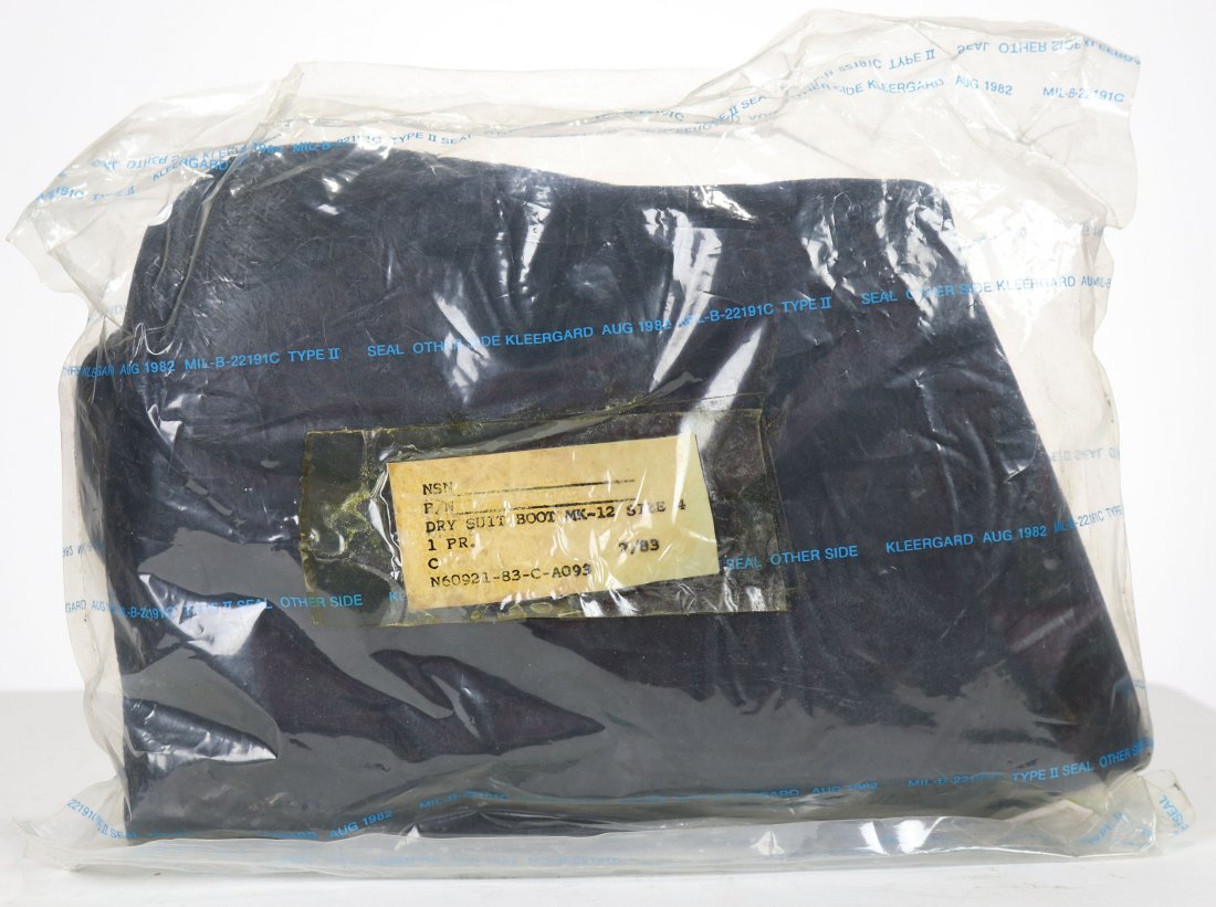US Navy Mark 12 Divers Dry Suit Boots New Old Stock: Pair of unused original US Navy Mark 12 divers dry suit boots, size 4. Have been sealed up in plastic bag since 1983.