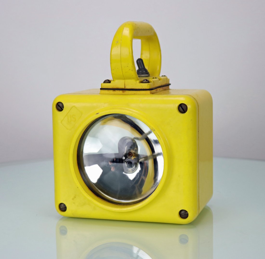 Vintage Roflan Ships Handheld Deck Light: Almost like new appearing vintage ships deck light. This unit was made by the Roflar Company in Topsfield, MA. Bright yellow exterior case with US on the front. Case measures 6.75 inches wide, 5 inche