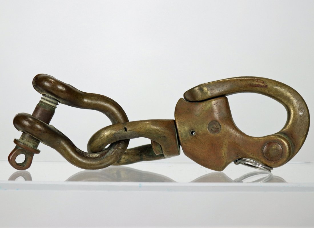 Brass Diving Helmet Quick Detachable Safety Clasps: Likely WWII era pair of quick detachable clasps. Commonly used clasps with commercial and military diving applications. Both clasps are in correct working order. Please refer to photos for condition s
