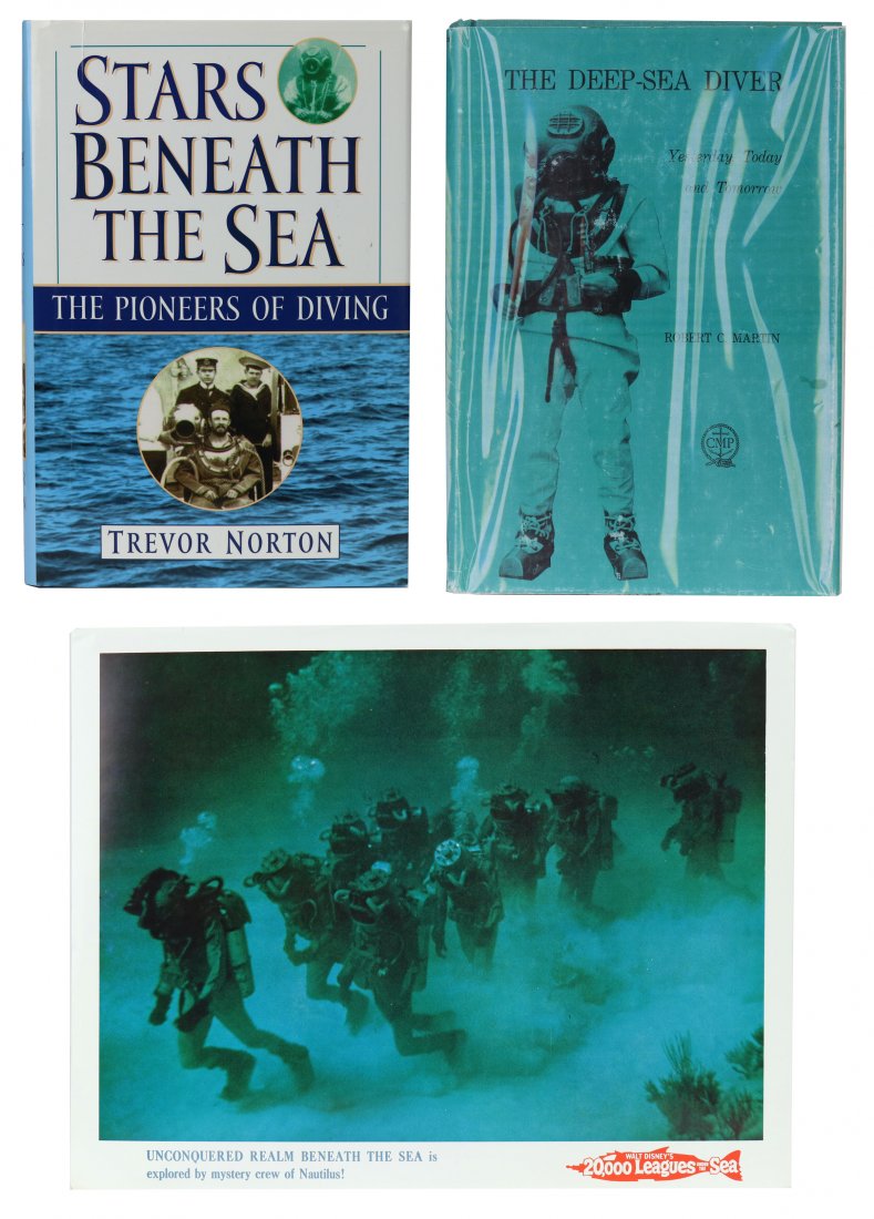 2 Diving Books & 20000 Leagues Movie Lobby Card: Lot consisting of two books and a 20,000 Leagues Under The Sea movie lobby card. The books are; Stars Beneath The Sea, The Pioneers of Diving by Trevor Norton, 1st Carroll & Graf Edition 2000, 282 pag