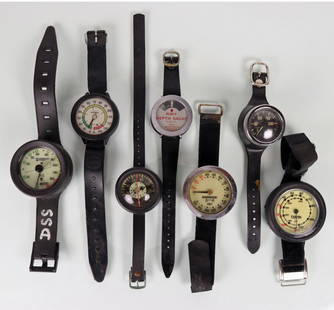 7 Vintage Scuba Depth Gauges Sportsways Navy + More: Collection of 7 vintage scuba diving depth gauges. Grouping consists of a Sportsways Navy model 1402, German made gauge 250 foot, DACOR, Tekna, Sherwood Scuba, Voit depth and compass, and a Sherwood 1