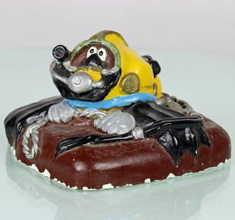 SONSUB Kirby Morgan Diving Helmet Chalk Desk Statue: Interesting hand painted hard resin desk statue or ornament. Features a cartoon like diver in a Kirby Morgan helmet. The back of the piece says SONSUB with an M92 and KHQ. Measures 5.5 inches square a