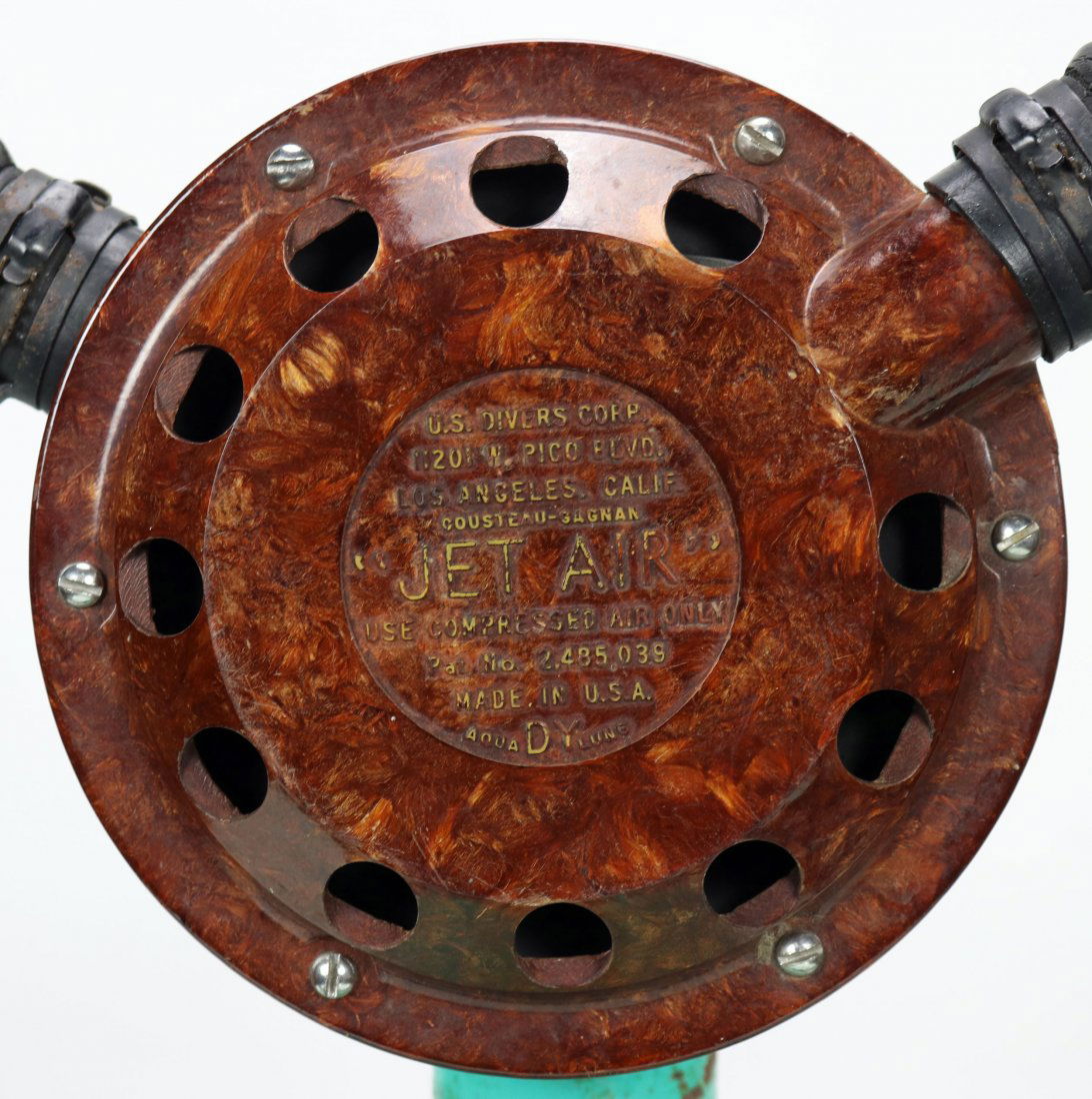 Nice 1956 Aqua-Lung Brown Phenolic Jet Air Regulator: Excellent example of a US Divers Jet Air double hose regulator. The body is made of a red or brownish color phenolic body, giving it a very unique appearance. When this model debuted it was made in th