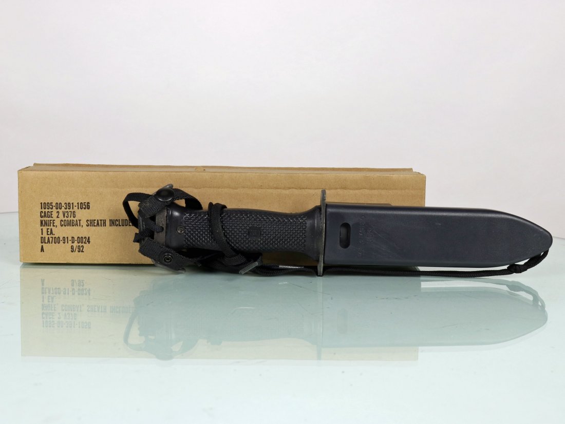 Mark 3 US Navy Combat Dive Knife: This is a Mark 3 US Navy combat dive knife that is new old stock in the original box. Made in September 1992. The blade has some slight wear from being removed from the sheath due to friction. Has USN