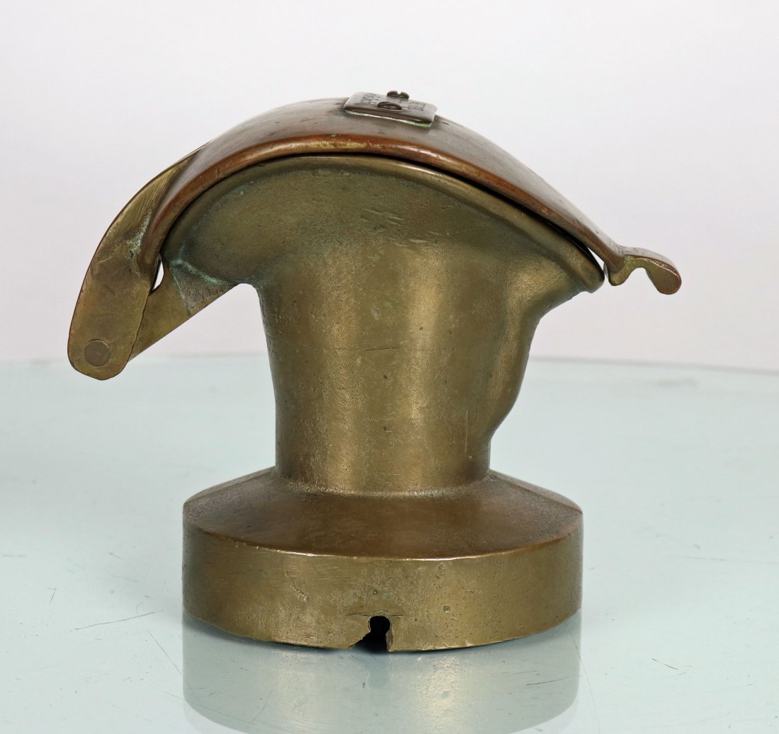Ships Speaking Tube 3 Inch AA Gun Fire Control: This is a solid brass speaking tube. There is one brass plaques on the inside and one on the outside of the cover and it is being held on with bolts. The plaque has the following verbiage: Port. Ford.