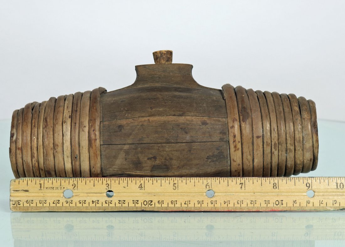 American Revolutionary Wood Canteen Water Keg: The previous owner stated that this purported American Revolutionary canteen came from a collection out of Maine. It is in excellent condition and is made from various types of wood. The overall lengt