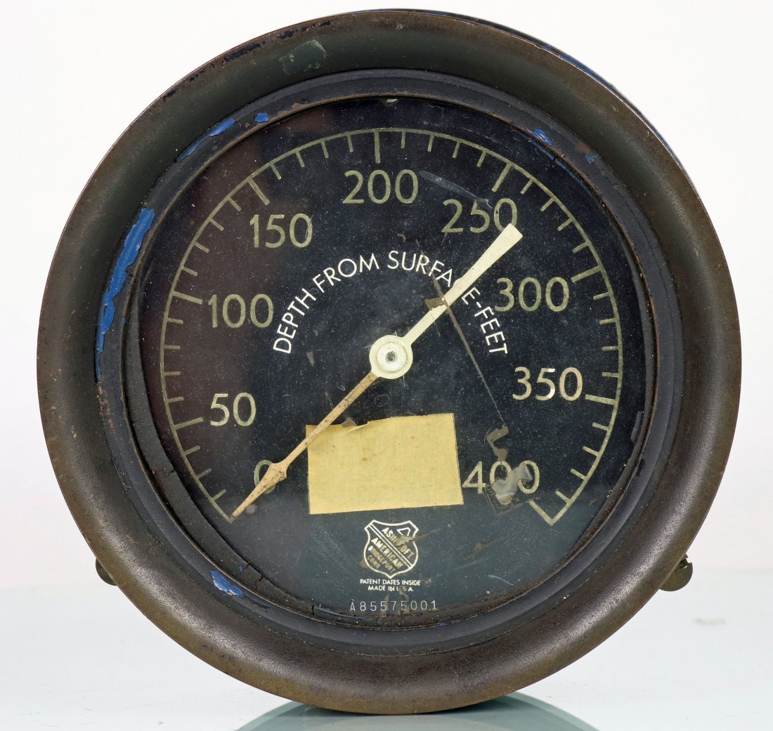 Vintage USN Depth From Surface - Feet Submarine Gauge: Authentic piece of US Navy and submarine equipment. This is a Depth From Surface â€“ Feet gauge. The case measures 7.5 inches in diameter, 8 pounds, and is made of brass. The gauge is in the orig