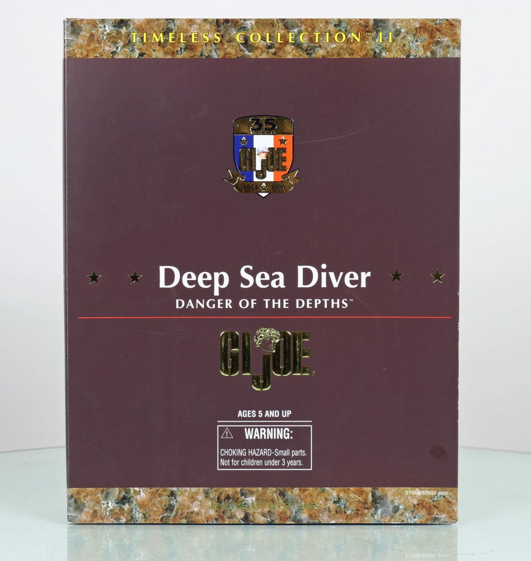 New In Box G.I. JOE Deep Sea Diver Danger Of The Depths: Very fun and highly detailed G.I. Joe Deep Sea Diver action figure! Brand new in box, this larger sized Mark V style diver was produced as part of the G.I. Joe Timeless Collection II. These action fig