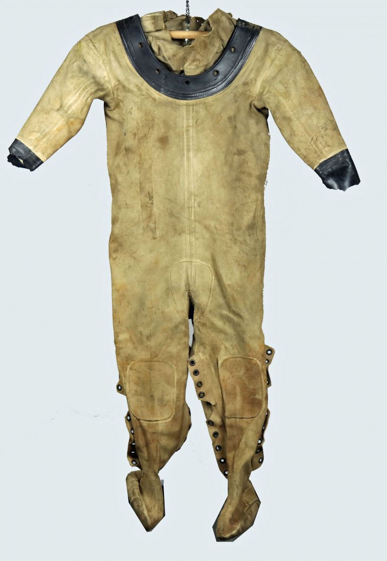 Mark V Dive Dress Converse 1966 + Pad + Bunny Suit: This is a grouping of two vintage dive dresses and a shoulder pad. The first piece is a canvas dive dress punched for a US Navy Mark V helmet. The dress was made by Converse Rubber in 1966. The dress 