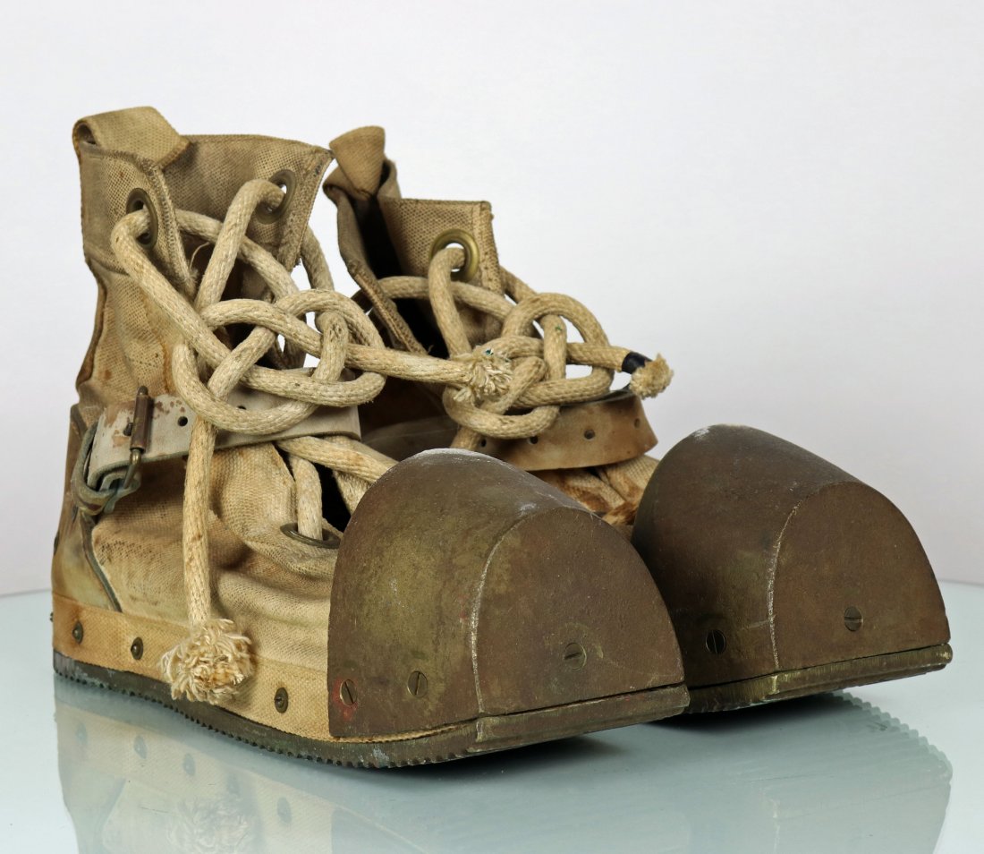 US Navy Lightweight Canvas Diving Boots Brass Toe: Pair of United States Navy style lightweight diving shoes or boots. Constructed of a canvas body, rope laces, leather strap and heal, brass toe, wood insole, and corrugated brass sole. Boots have no m