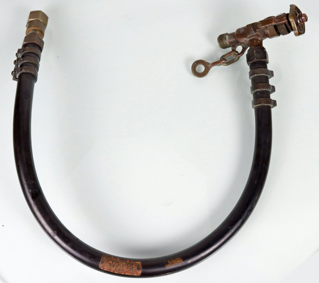 Mark V Diving Helmet Whip with DESCO Non Return Valve: This is original equipment primarily used with the US Navy Mark V diving helmet. Air control valve with no markings, 3-foot-long rubber hose or whip from unknown manufacturer and lastly a DESCO stampe