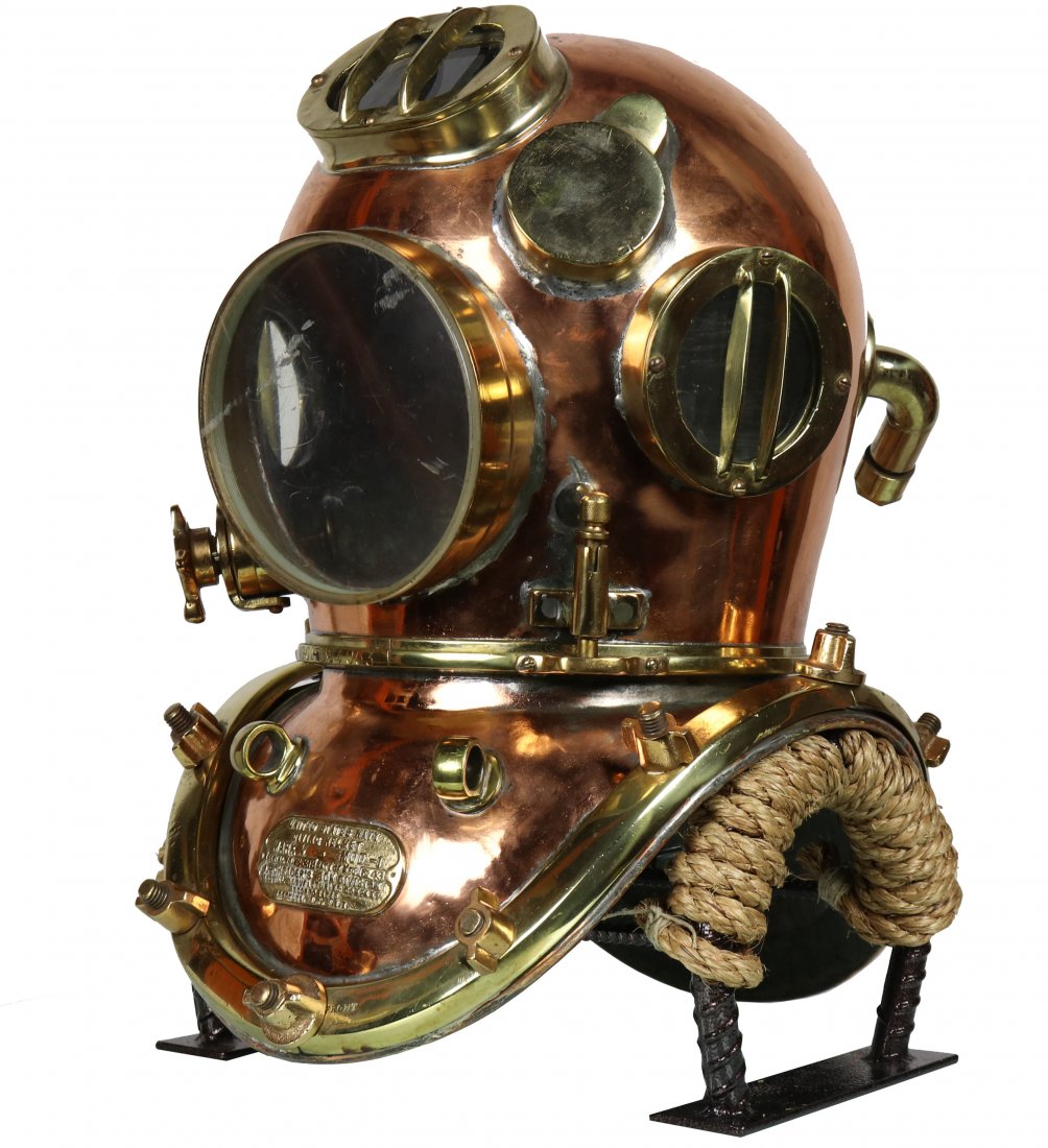 Customized 1943 US Navy Mark V Diving Helmet: Without a doubt, the Mark V is the most popular helmet we have the pleasure to handle. While challenging to find authentic examples, these were made in sizeable quantities during World War 2. While ma