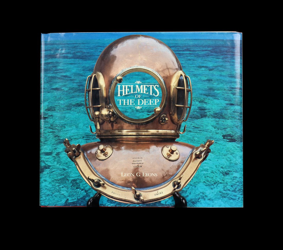 Helmets of The Deep Deluxe Leather Bound Book 79/100: Arguably the most famous book specifically about antique diving helmets. This is a deluxe leather bound Helmets of The Deep number 79 of only 100 made! Original dust jacket is intact. Inside the book 