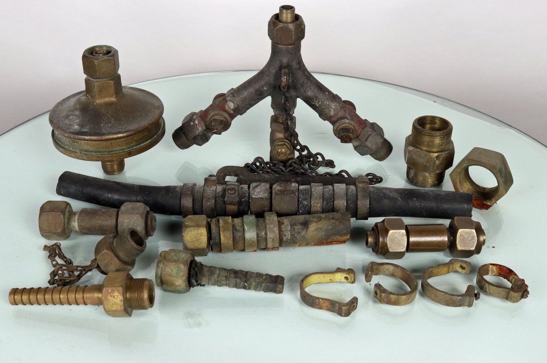 Grouping Of Brass Divers Air Fittings & Tools: Nice grouping of original divers air line parts, fittings and other components. Parts include a triple air manifold with a chained on wrench, Morse Diving Equipment brass air filter housing, brass dou