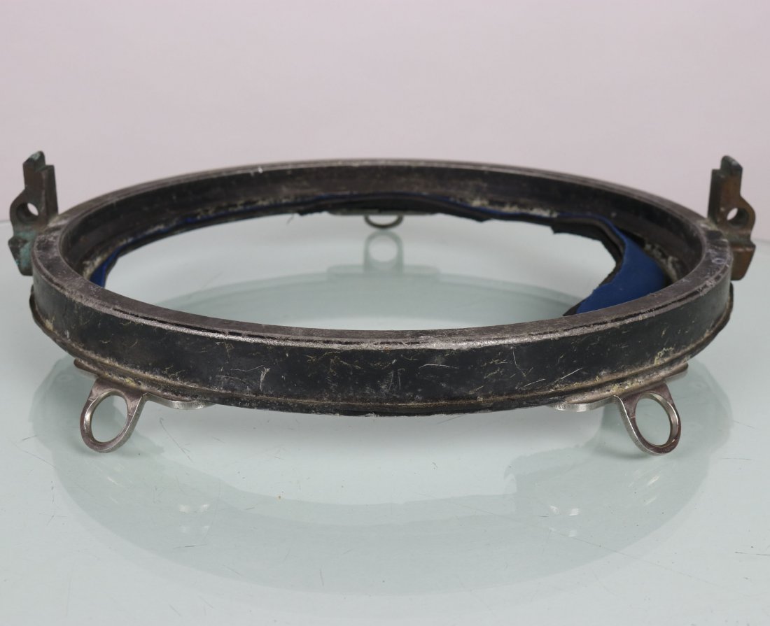 Mark 12 Diving Helmet Breech Ring â€“ Original & Round: This is the ring that attaches to the helmets and also the neoprene suit. These rings are commonly bent up on Mark 12 helmets decommissioned by the Navy. This ring is used but still in good condition