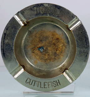 USS Cuttlefish Submarine Officers Ashtray: This is an original vintage ashtray from the US submarine U.S.S Cuttlefish. The tray measures 5.5 inches in diameter and is made of brass. The name USS Cuttlefish is clear on the top edge. Shows