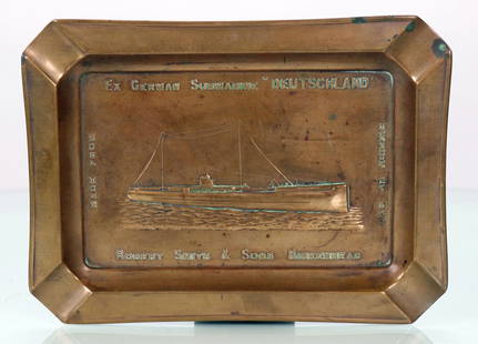 Ashtray Made From German Submarine Deutschland: This is a fascinating piece of submarine memorabilia and history. This is a copper ashtray made from the German submarine Deutschland. The ashtray features an image of the submarine in the center