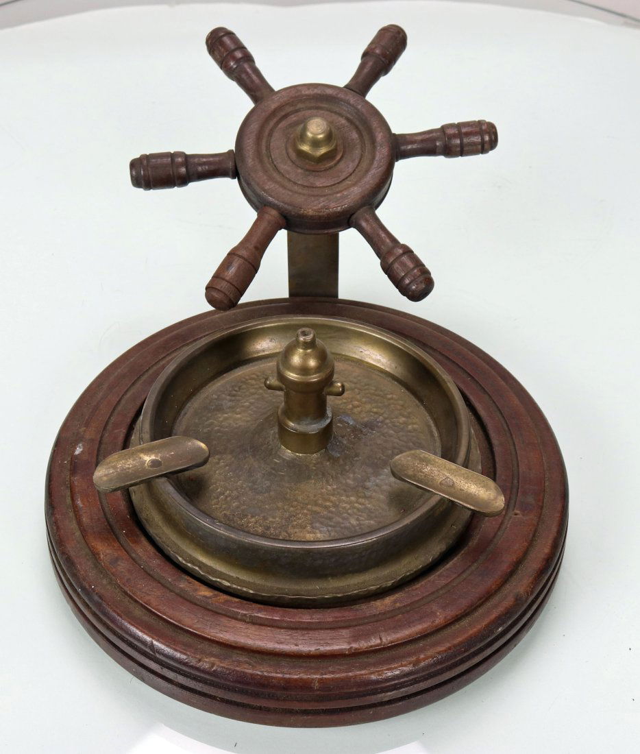 1944 USN Mark 4 25 Cal Shell Made Into Ashtray: Some talented ingenuity went into making this unique ashtray! This functional piece of art was constructed from a 5 inch Mark IV 25 caliber shell and firing pin. The bottom side of the shell is clearl