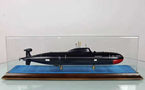 Soviet Akula Class Attack Submarine Model In Case: This is a very impressive and detailed model of a Soviet Akula Class Attack Submarine SSN. The model is housed in an acrylic display case with a wood base. The base of the case measures 19 inches