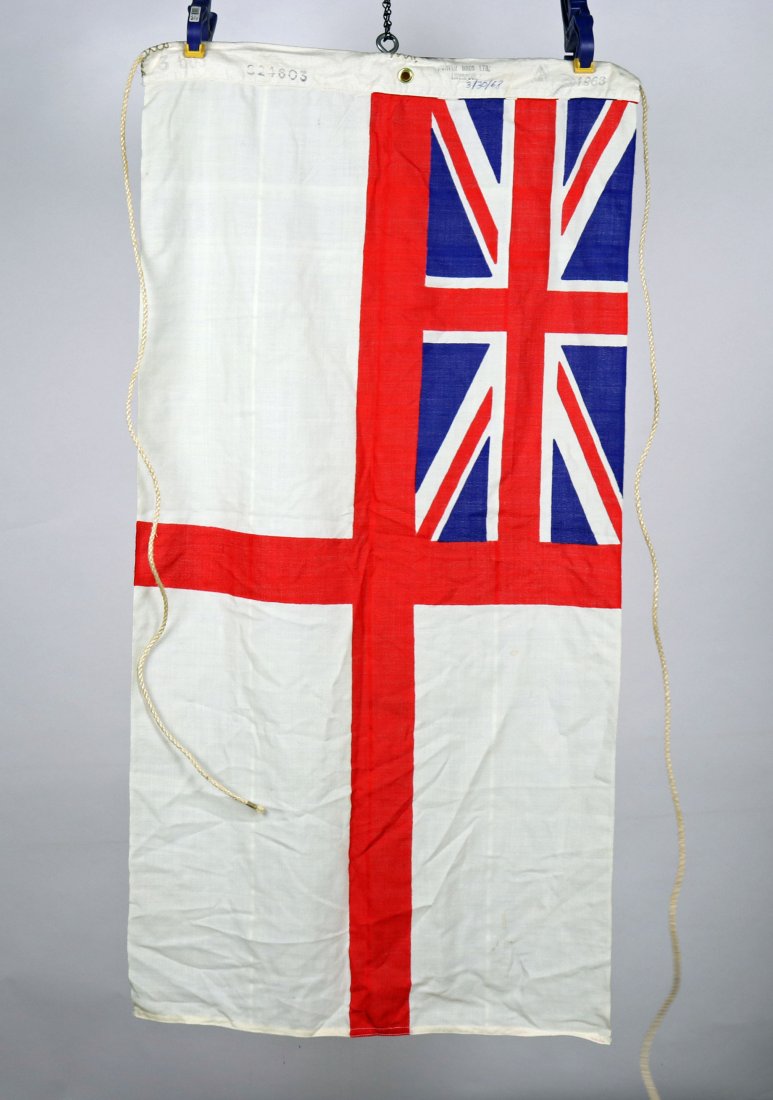 British Navy White Ensign Flag 1960s With Broad Arrow Stamp: Very nice white British Navy ensign flag. This example measures 26 inches tall and 53 inches long. It is dated with a stamp 1966 and was made by Porter Brothers in Liverpool. There is also a broad arr