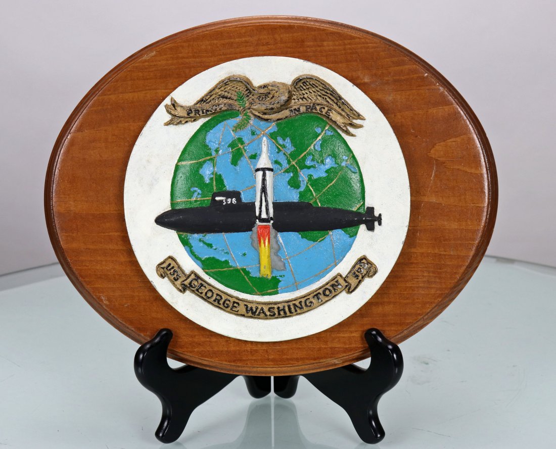USS George Washington 598 Submarine Metal Plaque: This is a vintage USS George Washington 598 submarine metal plaque mounted to a wood back. Measures 11 inches wide and 8.75 inches tall, weighs approximately 2.3 pounds. A great painted metal plaque f