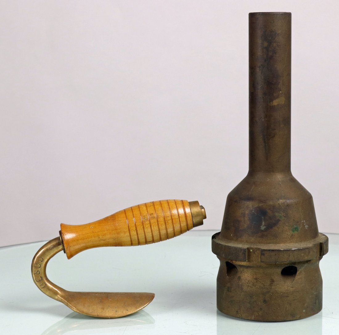 Vintage Divers Jetting Nozzle & DESCO Cuff Expander: This grouping consists of a DESCO stamped cuff expander and a solid brass jetting nozzle. The cuff expander is in like new condition and features 3 DESCO stamps on it. These were used to help the dive