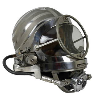 Joe Savoie Air Demand Stainless Steel Helmet Featured On Hawaii Five-O: In the 21st Century diving helmets made by Joe Savoie have been recognized among historians and collectors as one of the most revolutionary helmet designs ever conceived and put into use. The fact tha