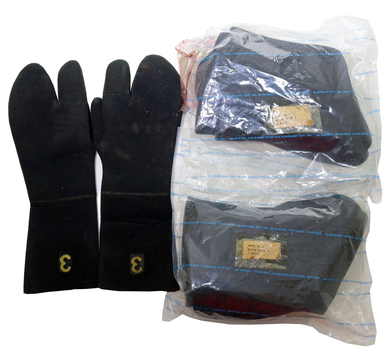 US Navy Mark 12 Divers Size 3 Gloves & Boots: This grouping of original US Navy Mark 12 components consists of one pair of size 3 neoprene gloves in good condition and two sealed neoprene boots, both size 3. The boots were sealed up in 1981 and h