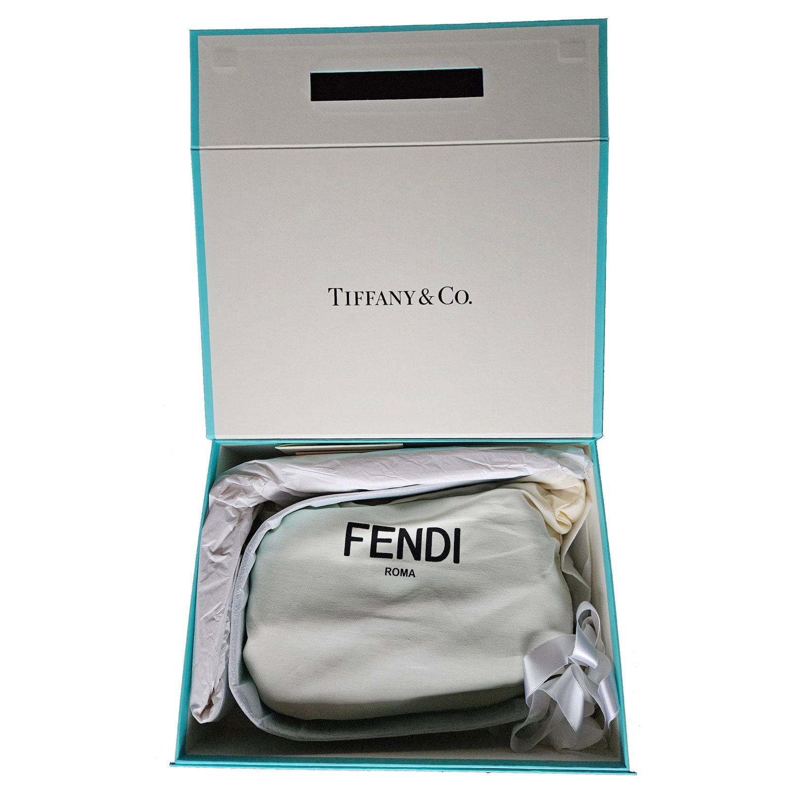 RARE Fendi x Tiffany & Co. Medium Baguette Bag – 25th Anniversary - Tiffany Blue: Celebrating a quarter-century of the Fendi Baguette, this exquisite 2023 limited-edition collaboration with Tiffany & Co. combines Italian fashion with New York luxury. Featuring the iconic Tiffany Bl