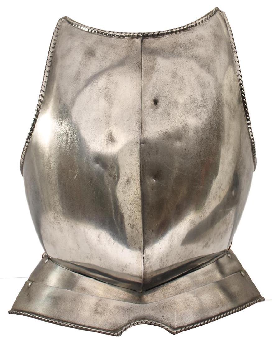 A BREASTPLATE AND GORGET IN 17TH CENTURY NORTH EUROPEAN: A BREASTPLATE AND GORGET IN 17TH CENTURY NORTH EUROPEAN STYLE, the three-piece gorget fitted for straps and with turned neck aperture, the breast plate of characteristic form with raised medial ridge,
