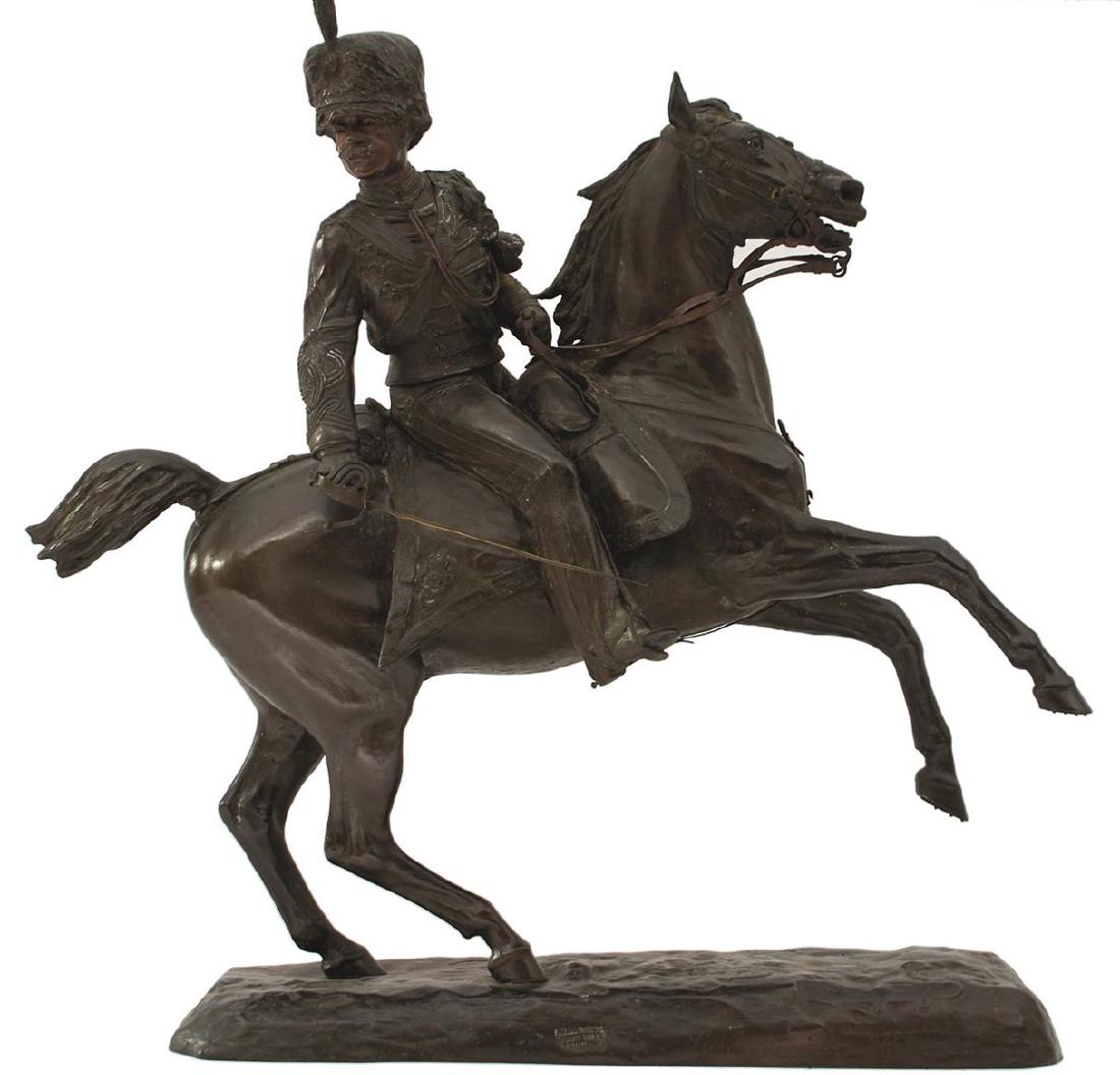 COMTE STANISLAO GRIMALDI DEL POGGETTO 1825-1903 Bronze: COMTE STANISLAO GRIMALDI DEL POGGETTO (1825-1903), Bronze, A Hussar wielding his sword astride a rearing horse, on naturalistic base with incised signature and Torino foundry stamp, 44cm high over all