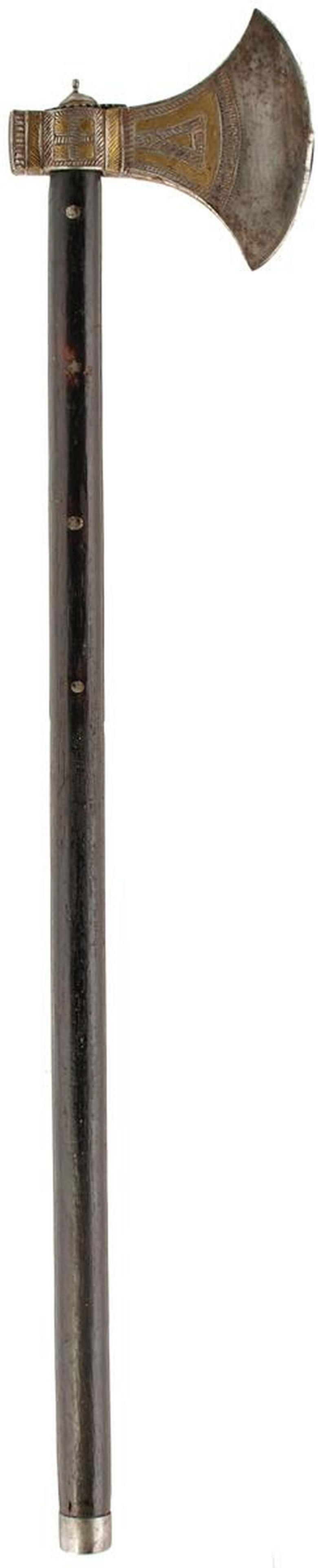 A 19TH CENTURY INDIAN AXE: A 19TH CENTURY INDIAN AXE, 11.5cm head chiselled with geometric borders highlighted in brass, 61.5cm wooden haft, together with a further Indian axe decorated with elephant in silver, a bill hook and 