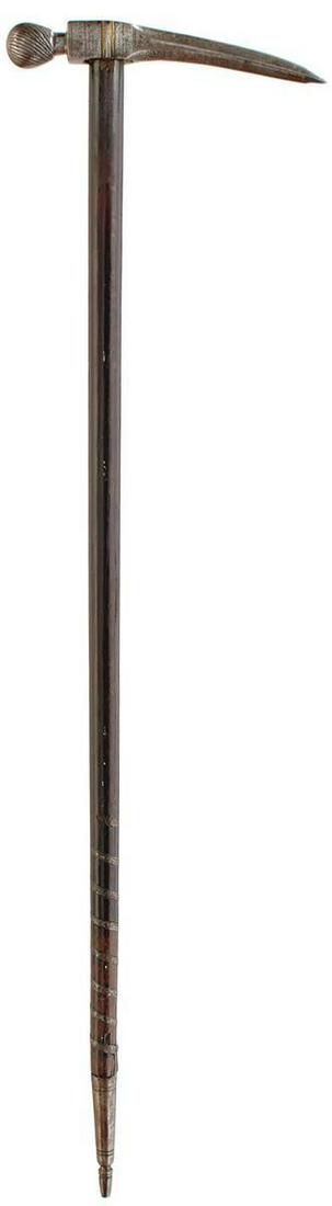 A LATE 17TH CENTURY OTTOMAN HORSEMAN'S OR WAR HAMMER,: A LATE 17TH CENTURY OTTOMAN HORSEMAN'S OR WAR HAMMER, 23cm head with tapering square section fluke, linear and circle decorated body with brass inlays, spirally chiselled spherical head, 83.5cm taperi