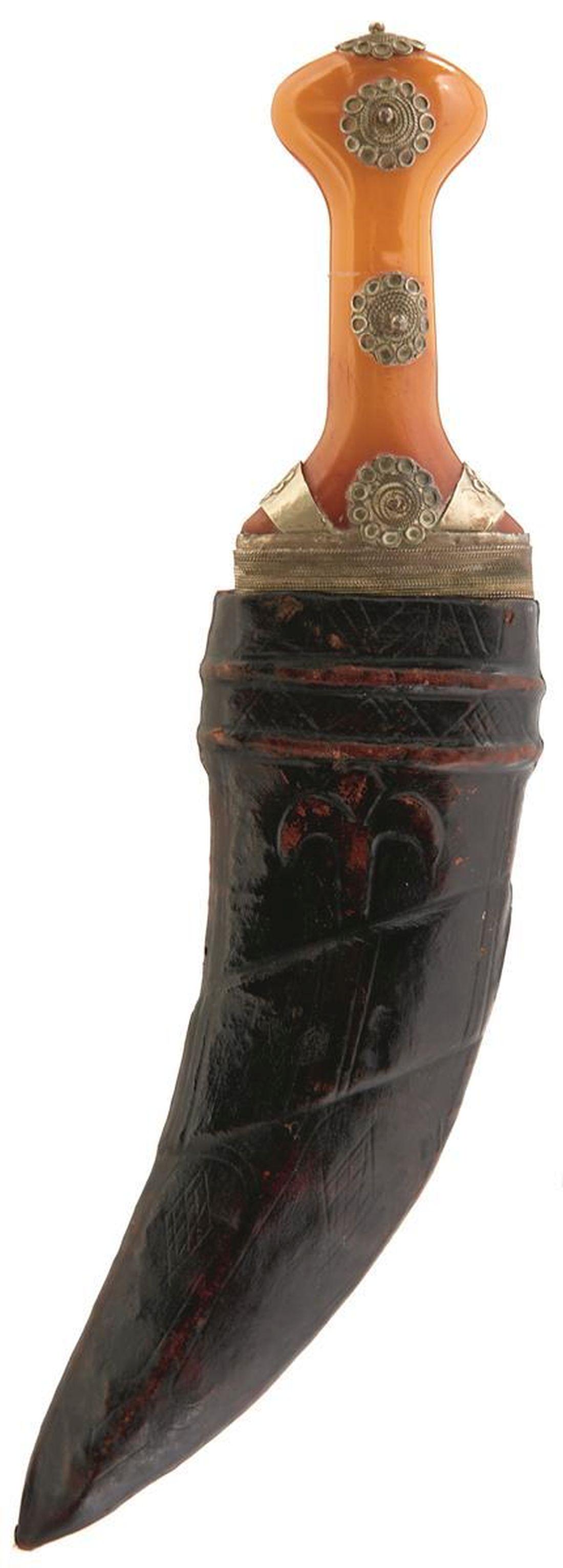 A BRACE OF OMANI JAMBIYA, 21cm sharply curved blade: A BRACE OF OMANI JAMBIYA, 21cm sharply curved blade with raised medial ridge, characteristic white metal mounted orange coloured hilt, contained in its tooled leather scabbard, together with another s