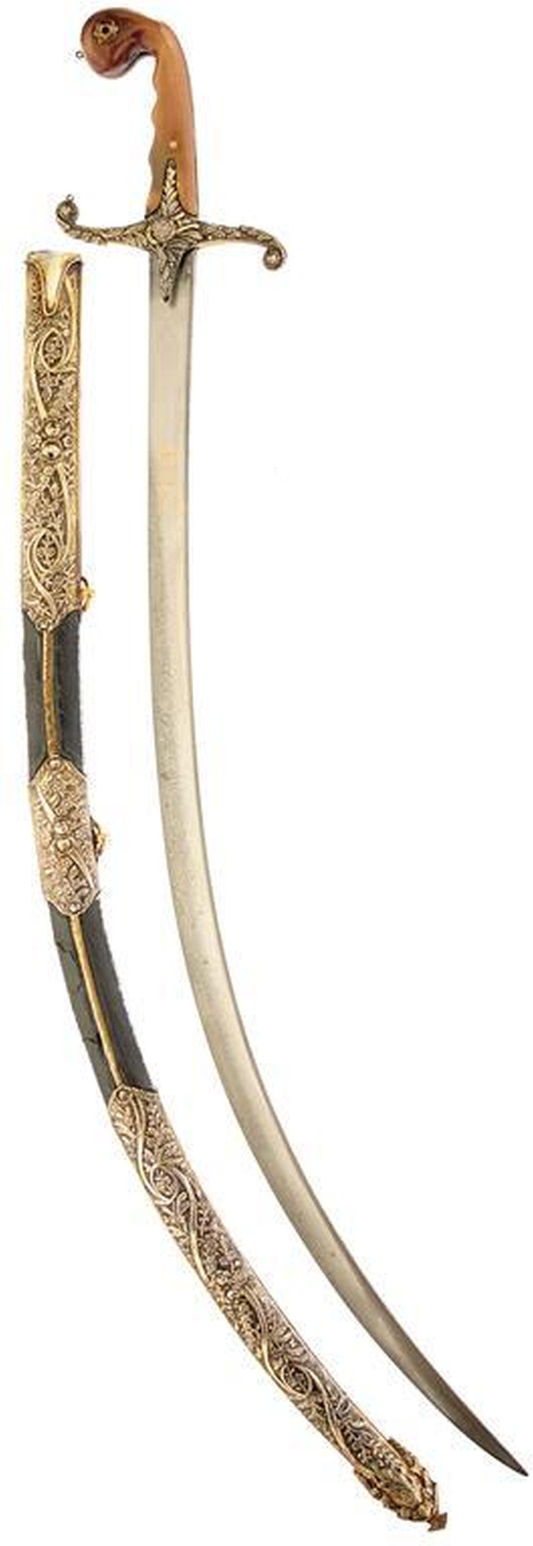 A FINE QUALITY 19TH CENTURY TURKISH OR OTTOMAN: A FINE QUALITY 19TH CENTURY TURKISH OR OTTOMAN SHAMSHIR, 82.5cm sharply curved fine damascus blade signed and inlaid with three panels in gold, characteristic gilt hilt deeply chiselled with acanthus 