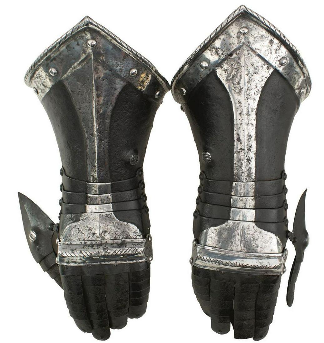 A PAIR OF GERMAN BLACK AND WHITE GAUNTLETS IN THE 17TH (1 of 16)