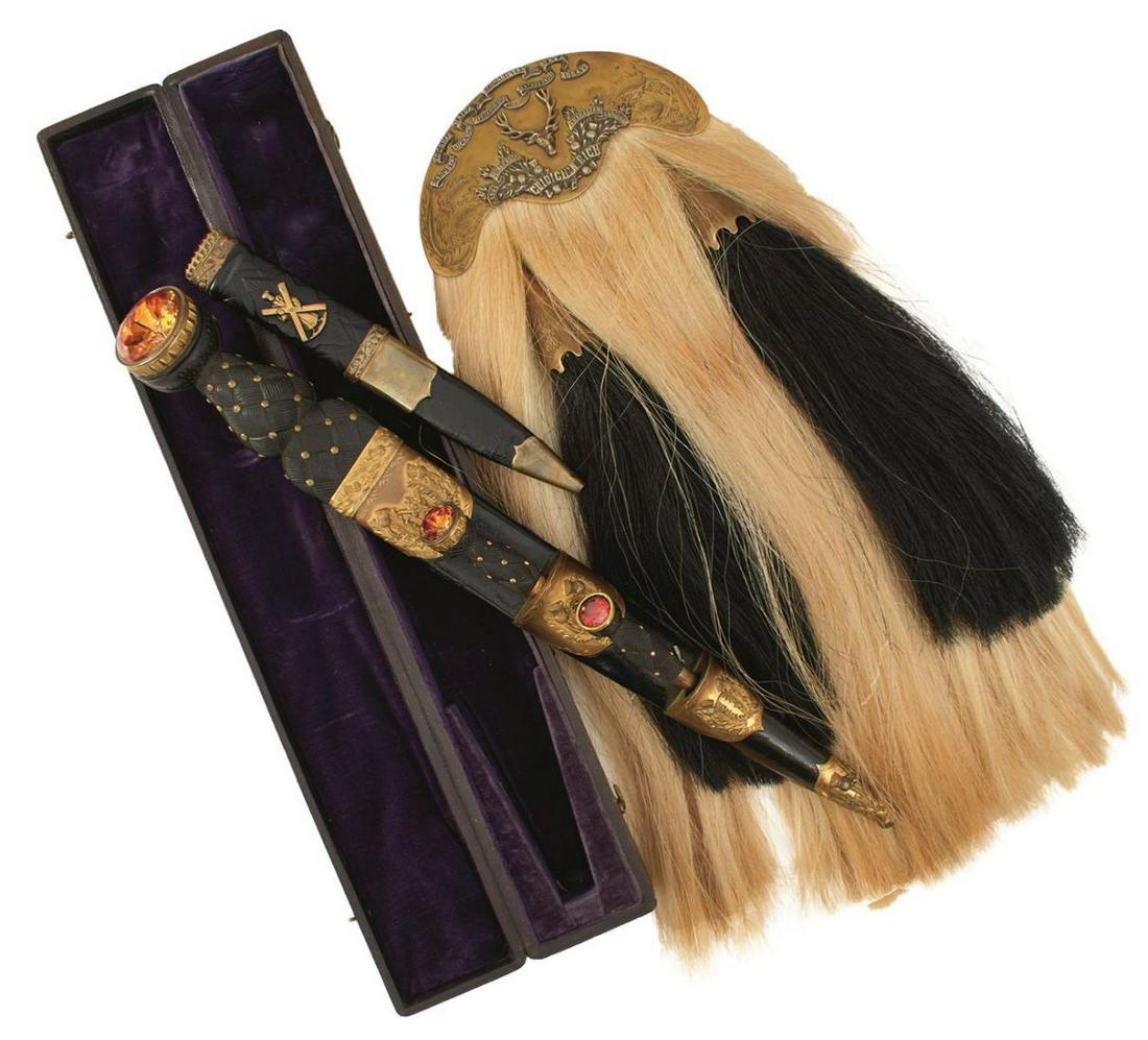 A VICTORIAN SCOTTISH OFFICER'S CASED DIRK SGIAN DUBH AND SPORRAN SET: A VICTORIAN SCOTTISH OFFICER'S CASED DIRK SGIAN DUBH AND SPORRAN SET, the dirk with 27.5cm fullered clipped back blade with faceted back edge, characteristic hilt with gilt mounts, the pommel set with
