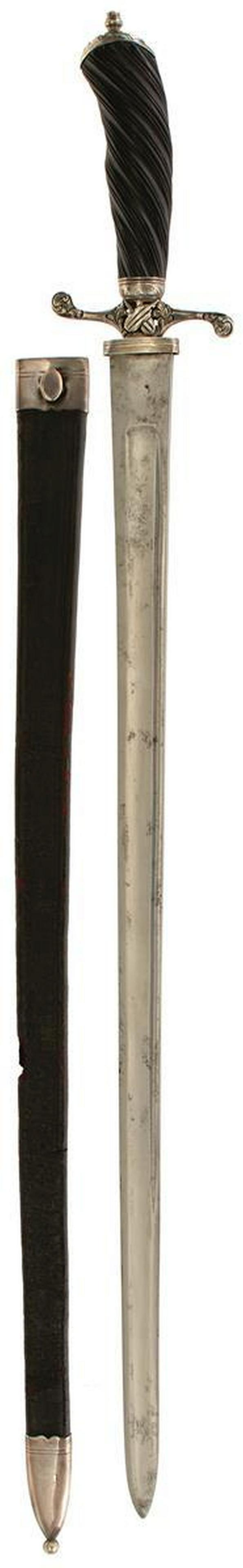 AN 18TH CENTURY HUNTING HANGER: AN 18TH CENTURY HUNTING HANGER, 55.5cm fullered blade double edged towards the tip, characteristic white metal hilt with recurved guard decorated with rococo scrolls, the mid-point pierced and decorat