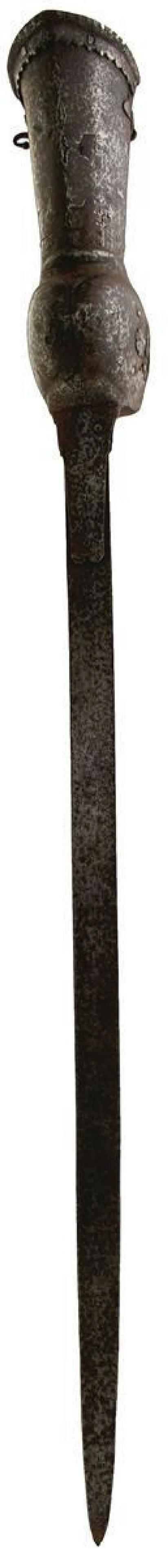 A LATE 18TH CENTURY INDIAN PATA OR SWORD, 96cm blade with riveted reinforcing straps at the forte,: A LATE 18TH CENTURY INDIAN PATA OR SWORD, 96cm blade with riveted reinforcing straps at the forte, characteristic gauntlet hilt with geometric cuff, rotating tubular grip secured by rivets with foliat