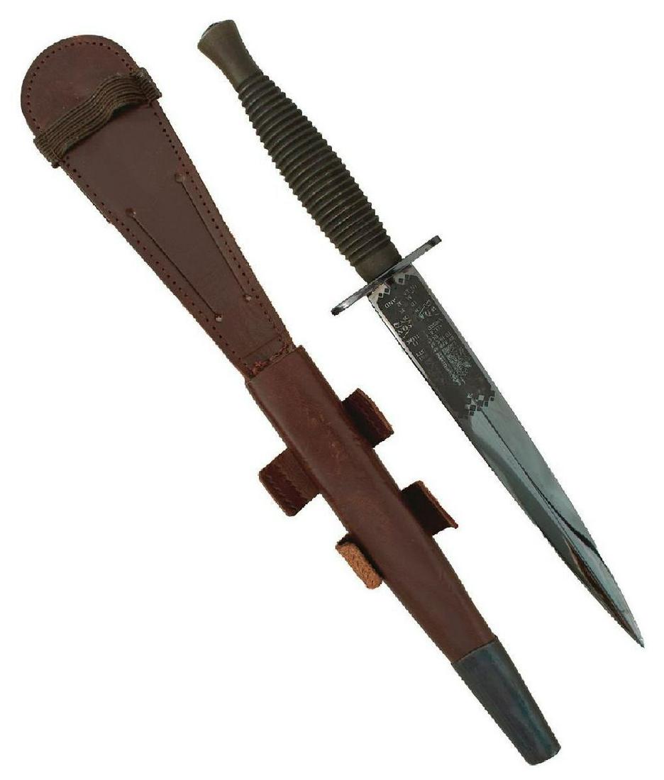 A CLEAN THIRD PATTERN FAIRBAIRN-SYKES COMMANDO KNIFE OR DAGGER, 17.25cm pristine blacked blade: A CLEAN THIRD PATTERN FAIRBAIRN-SYKES COMMANDO KNIFE OR DAGGER, 17.25cm pristine blacked blade etched with a Wilkinson Sword maker's panel, regulation hilt with ribbed anodised grip, contained in its