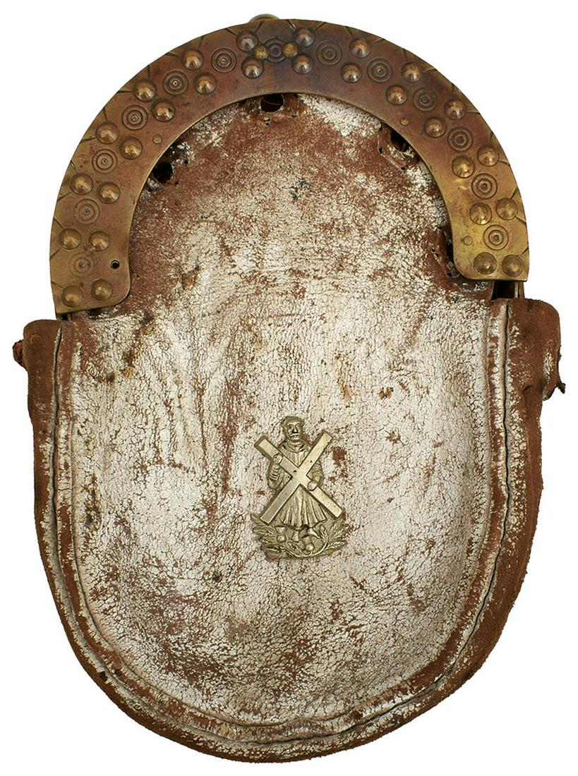 A MID-20TH CENTURY SCOTTISH BLACK WATCH SPORRAN, the brass cantle with circle and dot decoration,: A MID-20TH CENTURY SCOTTISH BLACK WATCH SPORRAN, the brass cantle with circle and dot decoration, the buff leather body with traces of white finish, applied with the regimental badge. WD marked to the
