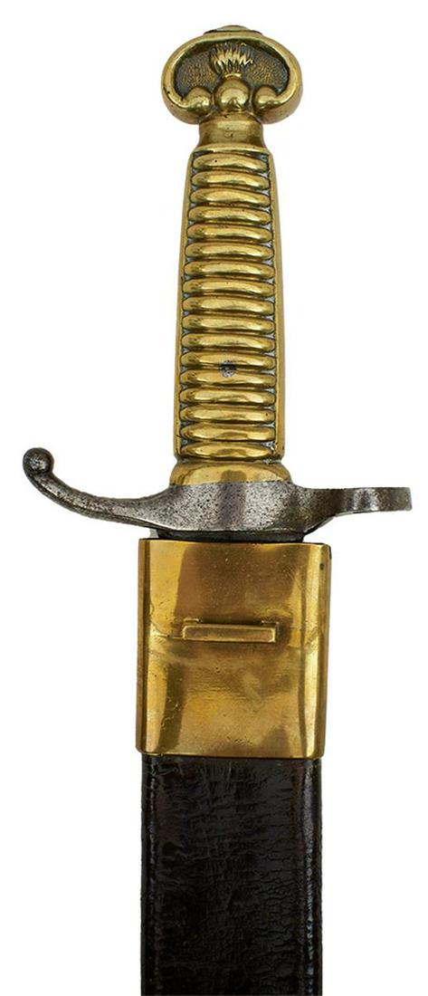 A RARE SPANISH MODEL 1858 ARTILLERY BAYONET, 44cm clipped back fullered blade etched FABRICA D: A RARE SPANISH MODEL 1858 ARTILLERY BAYONET, 44cm clipped back fullered blade etched FABRICA D TOLEDO and ANO D 1865, characteristic hilt with ribbed brass grip and flaming grenade pommel, serial no. 