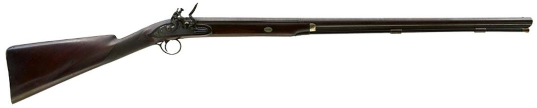 A 15-BORE FLINTLOCK SPORTING GUN BY SIMMONS, 31.25inch sighted octagonal damascus barrel, platinum: A 15-BORE FLINTLOCK SPORTING GUN BY SIMMONS, 31.25inch sighted octagonal damascus barrel, platinum lined breech set with a maker's tablet for JOSEPH SIMMONS, border engraved stepped and signed lock de